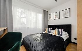 Modern Black & Wooden Apartment Warsaw Near The Airport By Noclegi Renters